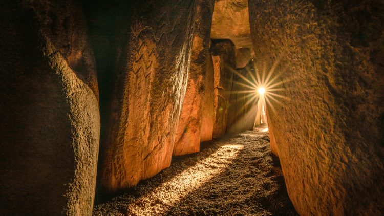 A photo inside Newgrange. Image Credit: KEN WILLIAMS/SHADOWSANDSTONE.COM