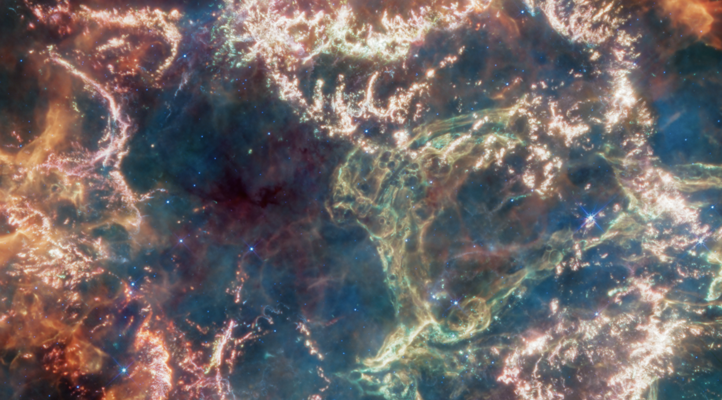 Cropped near-infrared image of Cassiopeia A (Cas A). Image Credit: NASA, ESA, CSA, D. D. Milisavljevic (Purdue), T. Temim (Princeton), I. De Looze (Ghent University). Image Processing: J. DePasquale (STScI).