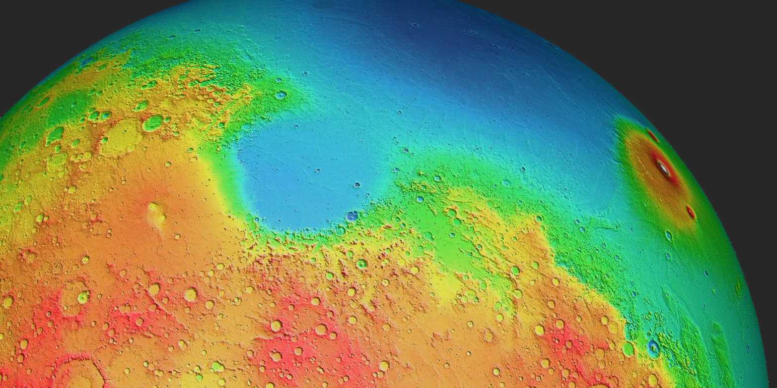Mars presents a stark dichotomy: the northern hemisphere is characterized by expansive lowlands (depicted in blue), while elevated plains predominantly occupy the southern region. (Image Credit: MOLA Science Team)
