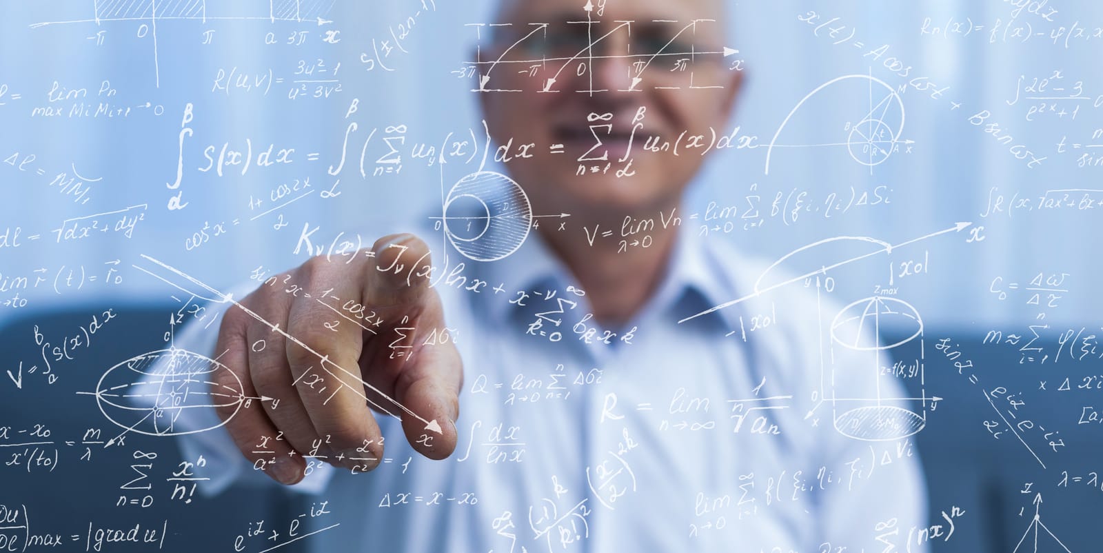 An image of a man pointing to mathematic formulas.
