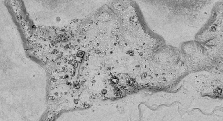 INAH photograph from an earlier Maya-city report, used for context in a report about Minanbé