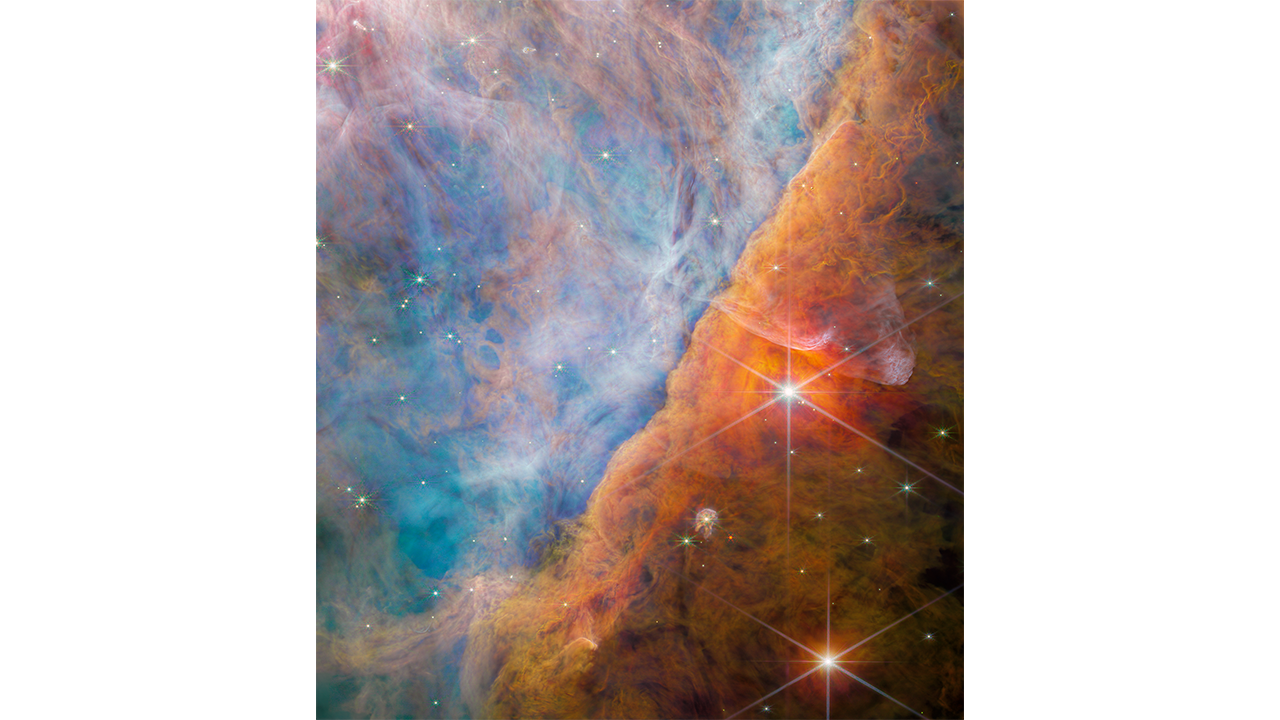 This captivating photograph, captured by Webb's NIRCam (Near-Infrared Camera), unveils a segment of the Orion Nebula referred to as the Orion Bar. Image Credit: ESA/Webb, NASA, CSA, M. Zamani (ESA/Webb), and the PDRs4All ERS Team.