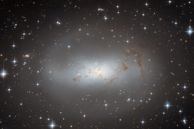 Hubble Telescope Sheds Light on an Enigmatic Galaxy. Image Credit: ESA/Hubble & NASA, R. Tully.