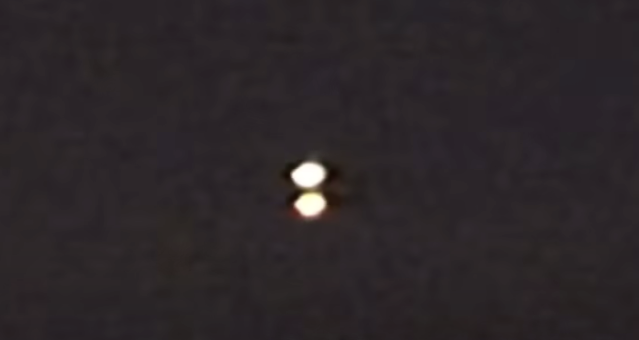 Incredible video of a UFO splitting into two. YouTube.