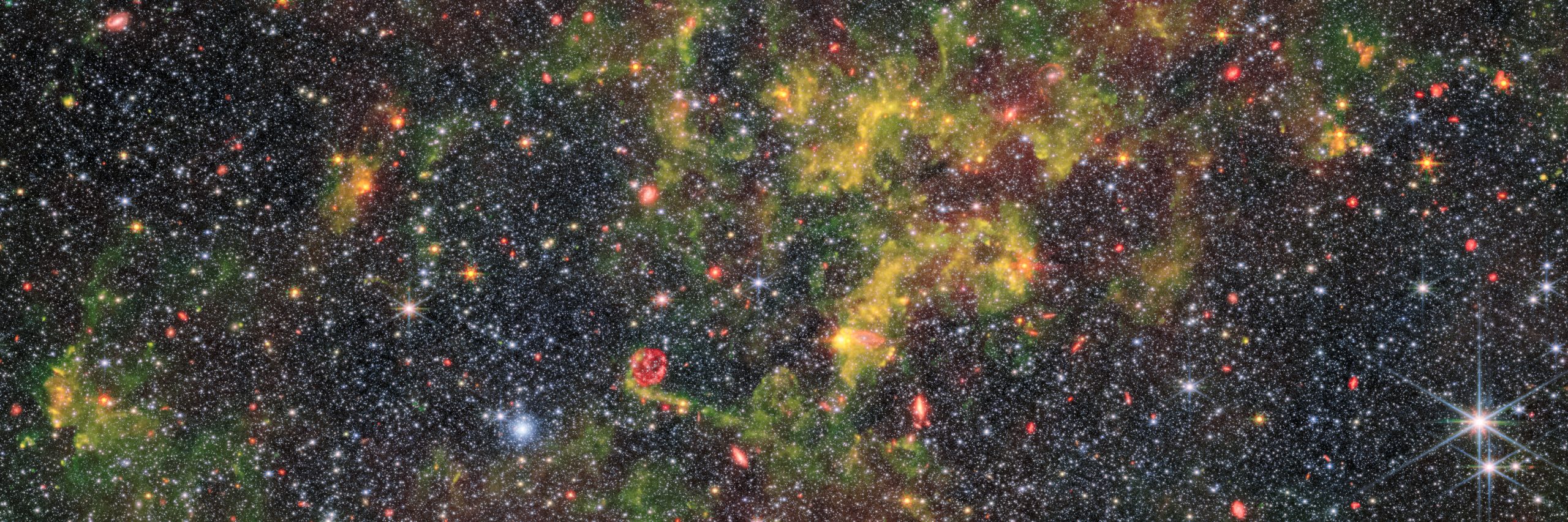 The irregular galaxy NGC 6822 as seen through James Webb's lenses. ESA/NASA.