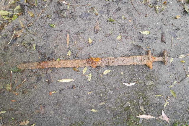 Man Finds Intact Viking Sword at the Bottom of a River. Credit: Trevor Penny.