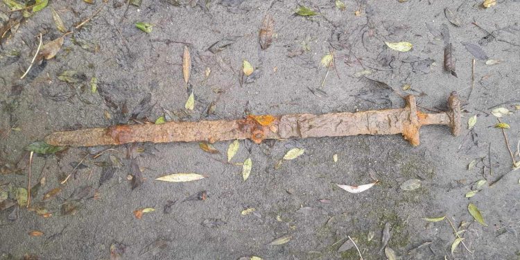 Man Finds Intact Viking Sword at the Bottom of a River. Credit: Trevor Penny.