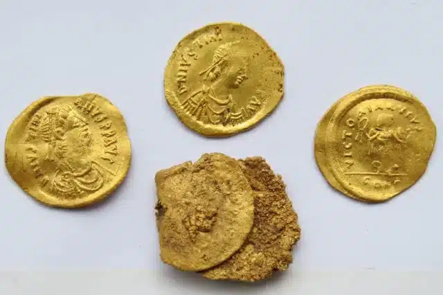 Sixth-century gold coins discovered during the excavation at Debnevo, Bulgaria. The front of the coins features Byzantine Emperor Justinian the Great adorned with a pearl diadem. (Image credit: Stiliyan Ivanov/National Archaeological Institute with Museum at the Bulgarian Academy of Sciences).