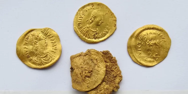 Sixth-century gold coins discovered during the excavation at Debnevo, Bulgaria. The front of the coins features Byzantine Emperor Justinian the Great adorned with a pearl diadem. (Image credit: Stiliyan Ivanov/National Archaeological Institute with Museum at the Bulgarian Academy of Sciences).