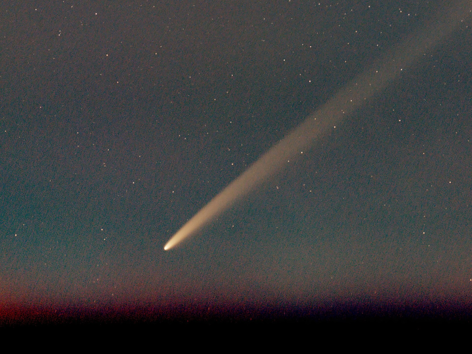 On September 28, 2024, Comet C/2023 A3 (Tsuchinshan-ATLAS) was beautifully captured from the island of Crete. The photograph was taken using a Samyang 135mm f/2 lens paired with an Olympus E-PL5 camera. A total of 26 frames, each with an 8-second exposure, were tracked and combined using DeepSkyStacker (DSS), resulting in a final exposure time of 3 minutes and 28 seconds. The image was later enhanced and processed using SIRIL to bring out the fine details of the comet. Image Credit: Wikimedia Commons/C messier.