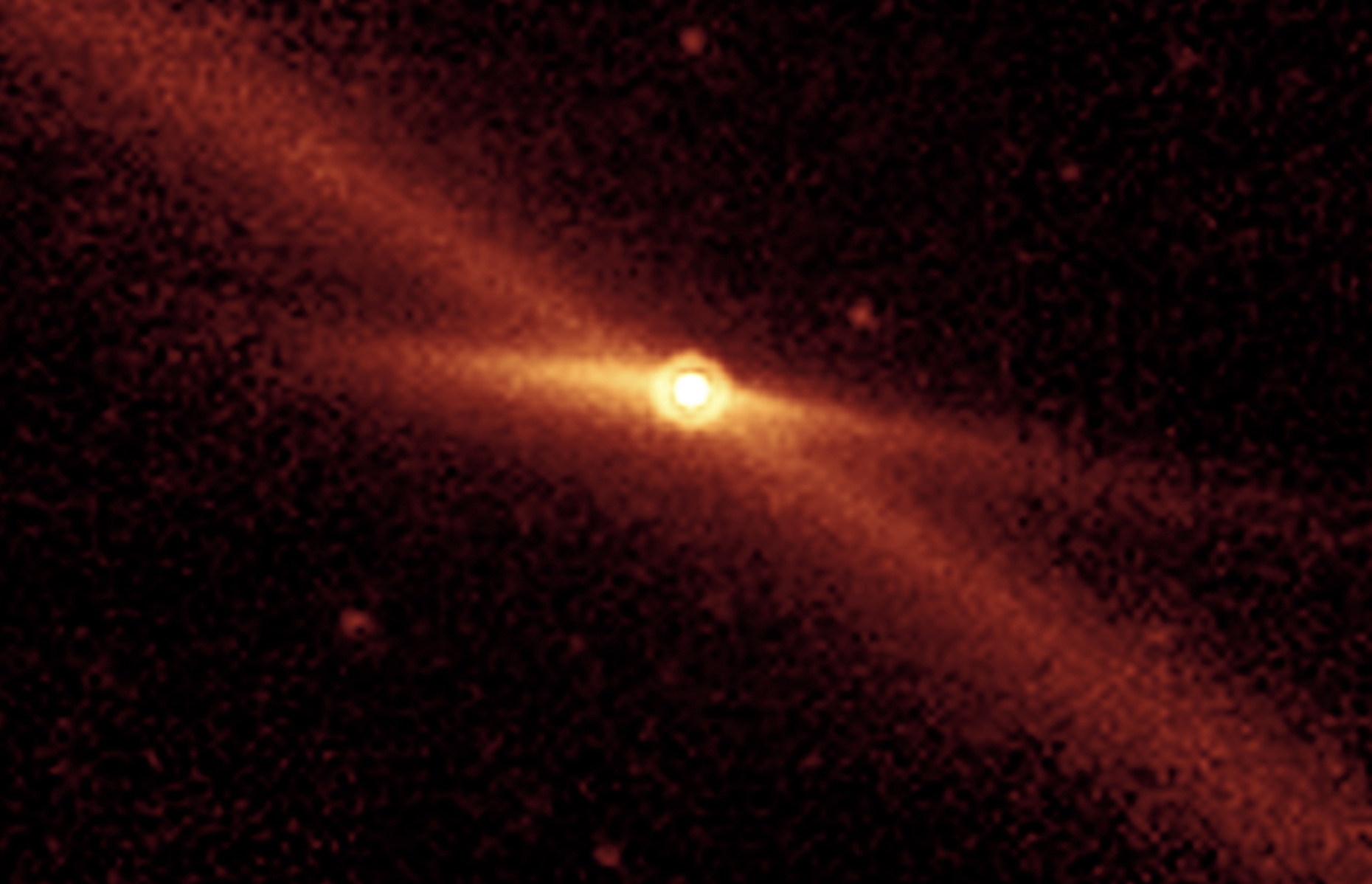 A Spitzer image of Encke and its debris trail in infrared light.