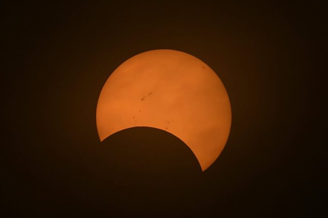 The eclipse begins with the appearance of a small 'bite' gradually being taken out of the Sun's surface.