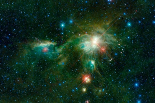 This infrared WISE image displays the Monoceros R2 molecular cloud, where stars are born. Credit: NASA/JPL-Caltech/IPAC.