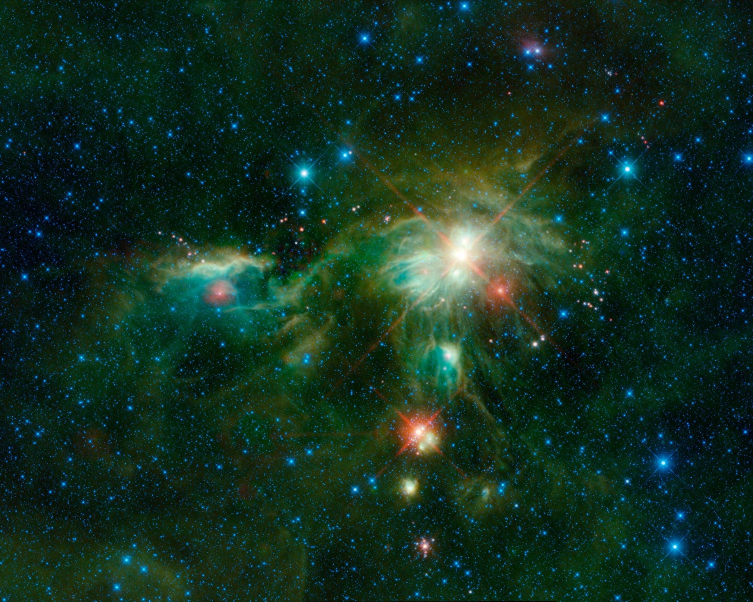 This infrared WISE image displays the Monoceros R2 molecular cloud, where stars are born. Credit: NASA/JPL-Caltech/IPAC.