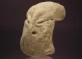 Reptilian figurine. Image Credit: https://pcma.uw.edu.pl/.