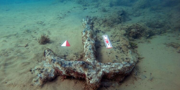 An ancient anchor that was discovered at the site. Image credit: Soprintendenza del Mare.