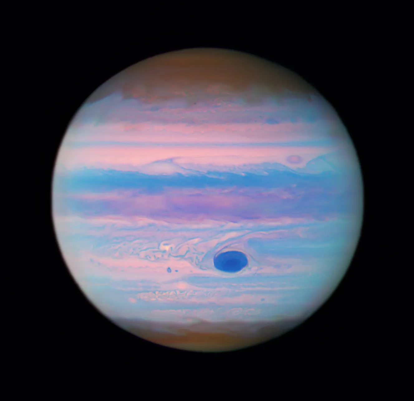 Jupiter revealed in ultraviolet light. Credit: NASA, ESA, and M. Wong (University of California – Berkeley); Processing: Gladys Kober (NASA/Catholic University of America).