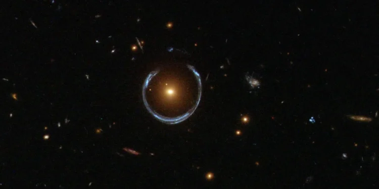 An image captured by the Hubble Space Telescope showcasing LRG 3-757, a galaxy famously known as the "Cosmic Horseshoe". (Image credit: NASA, ESA).