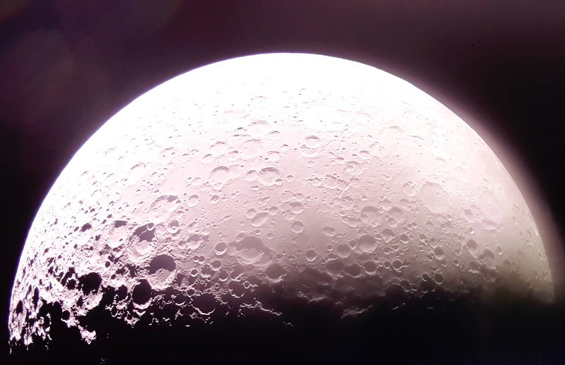 While orbiting the Moon, Firefly Aerospace’s Blue Ghost lander captured a remarkable image featuring the Moon’s south pole, visible on the far left of the frame. The photo, taken during its orbital journey, provides a rare perspective of this remote and scientifically significant region. Credit: Firefly Aerospace.