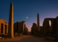An illustration of Obelisks, an ancinet Egyptian town and a star in the distance representing Sirius. Credit: Curiosmos.