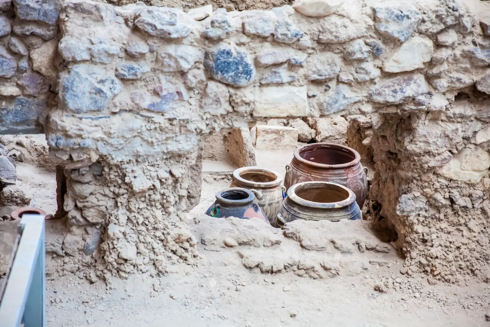 Lost cities buried beneath volcanic rock. Hre we have the remnants of Akrotiri.