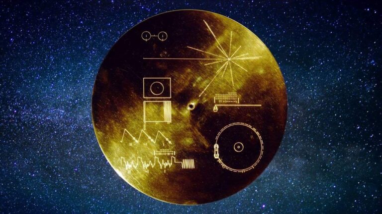 The engraved cover of the Voyager Golden Record against a star field.