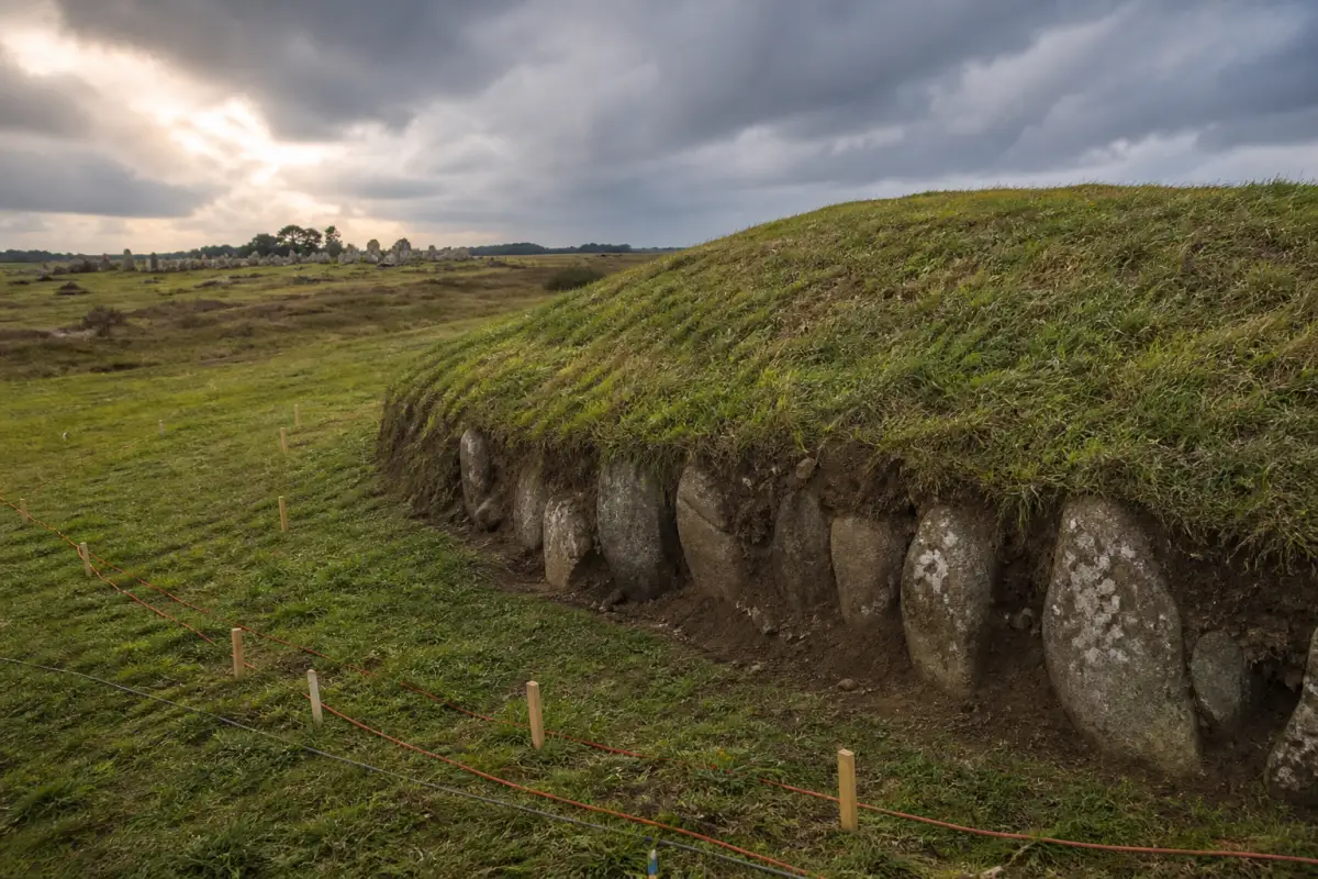 A Neolithic burial mound in Brittany with buried granite stones and archaeological survey cables