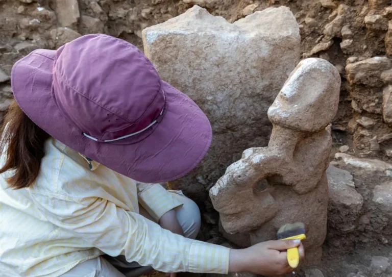 Karahantepe composite sculpture of a person seated on a leopard
