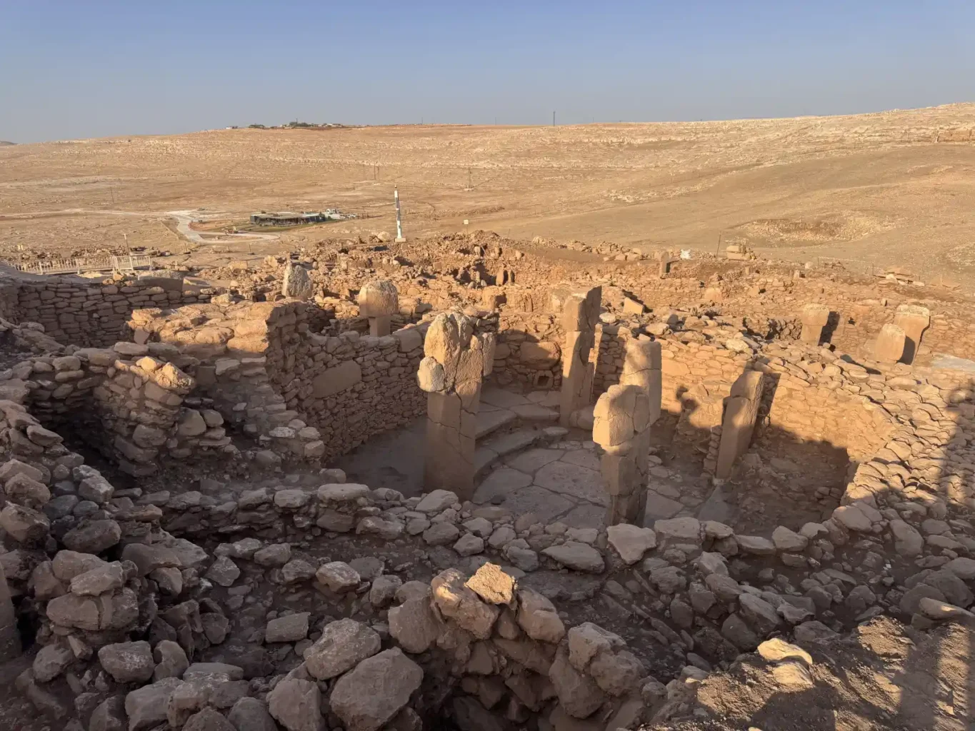 View across the excavated Neolithic buildings and stone pillars at Karahantepe