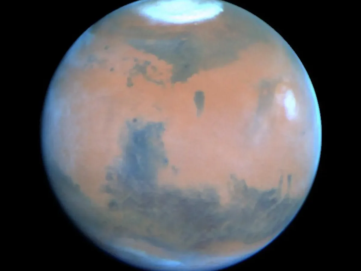 Hubble view of Mars showing the planet's red-orange surface
