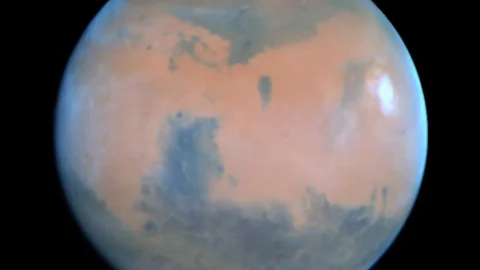 Hubble view of Mars showing the planet's red-orange surface