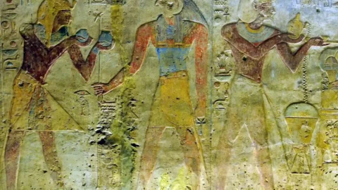 Ramesses II making an offering to Horus in an ancient Egyptian temple relief