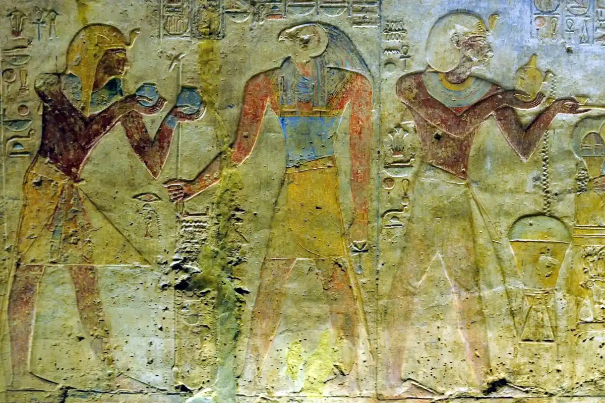 Ramesses II making an offering to Horus in an ancient Egyptian temple relief