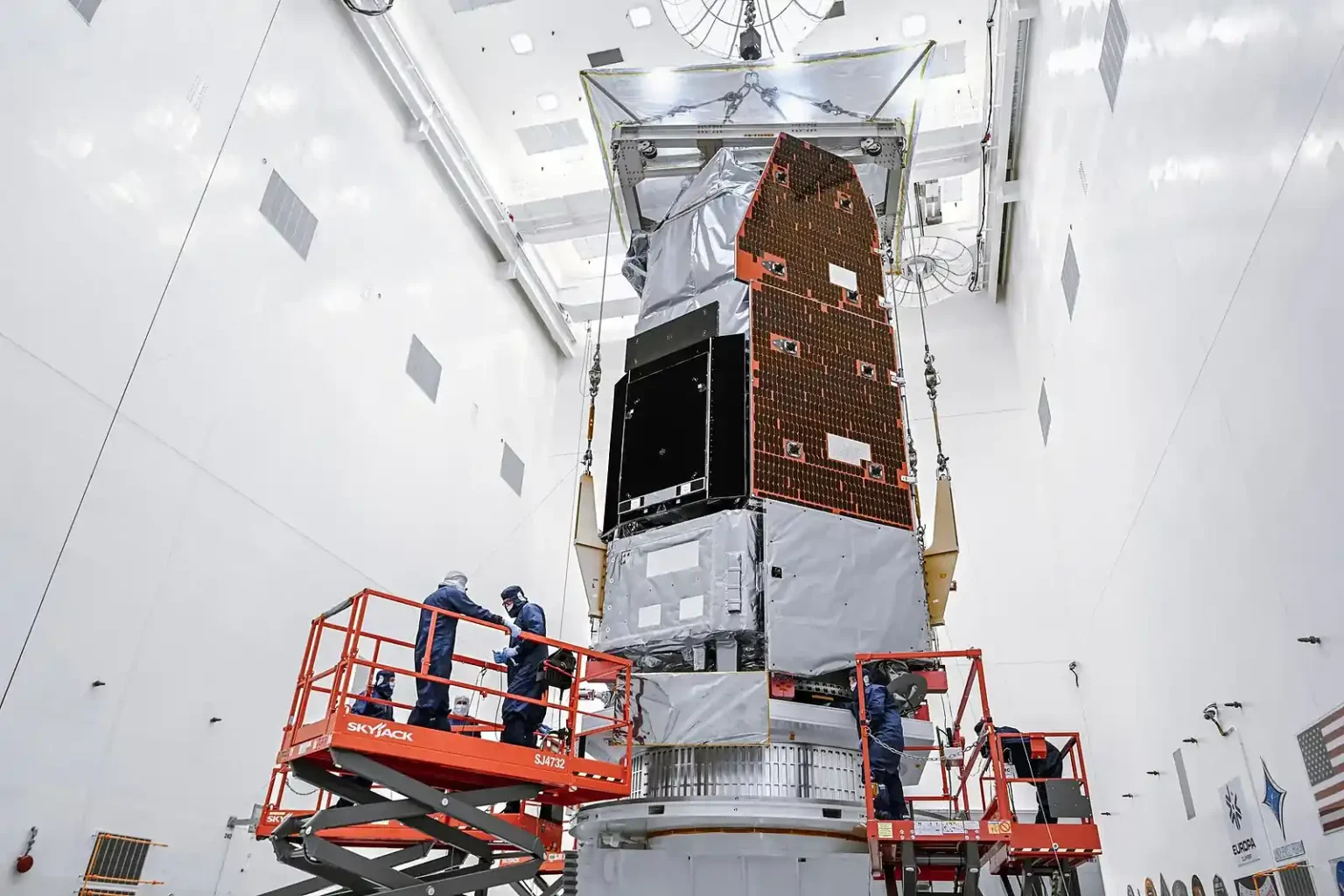 NASA technicians prepare the Nancy Grace Roman Space Telescope at Kennedy Space Center in Florida on June 26, 2026. Roman will survey the sky with a field of view at least 100 times larger than Hubble’s. Credit: NASA/Sydney Rohde (Rocz)