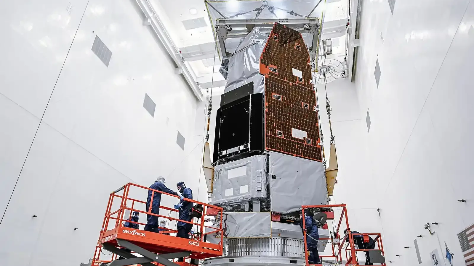 NASA technicians prepare the Nancy Grace Roman Space Telescope at Kennedy Space Center in Florida on June 26, 2026. Roman will survey the sky with a field of view at least 100 times larger than Hubble’s. Credit: NASA/Sydney Rohde (Rocz)