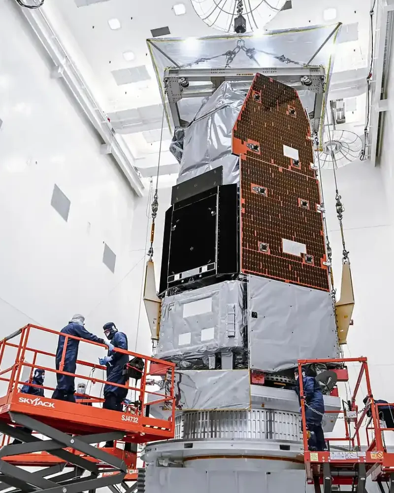 NASA technicians prepare the Nancy Grace Roman Space Telescope at Kennedy Space Center in Florida on June 26, 2026. Roman will survey the sky with a field of view at least 100 times larger than Hubble’s. Credit: NASA/Sydney Rohde (Rocz)