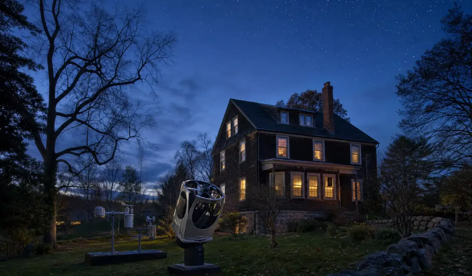 A telescope dome and observatory beside a house associated with astronomer Carl Sagan.