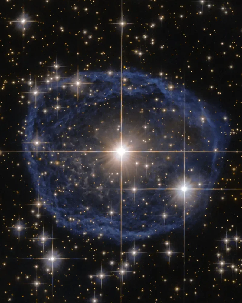 Hubble image of a glowing bubble of gas around an aging star