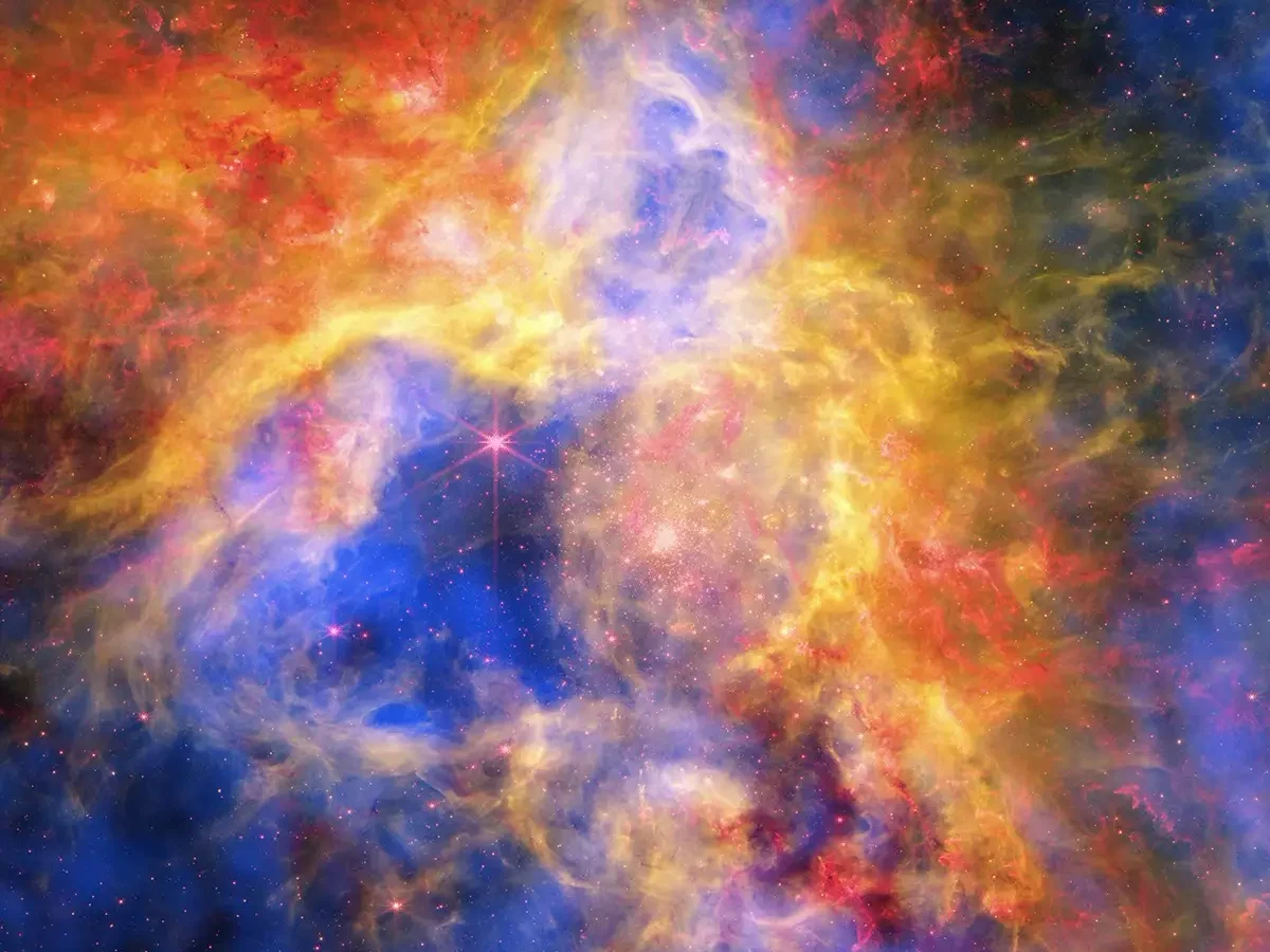 Multiwavelength view of the Tarantula Nebula showing blue X-ray gas, red infrared dust and green optical hydrogen