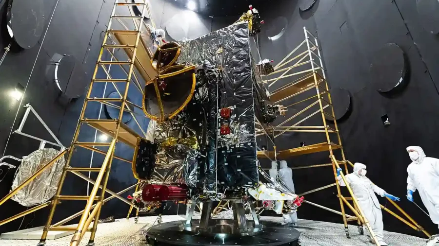 A spacecraft structure tested inside a thermal vacuum chamber