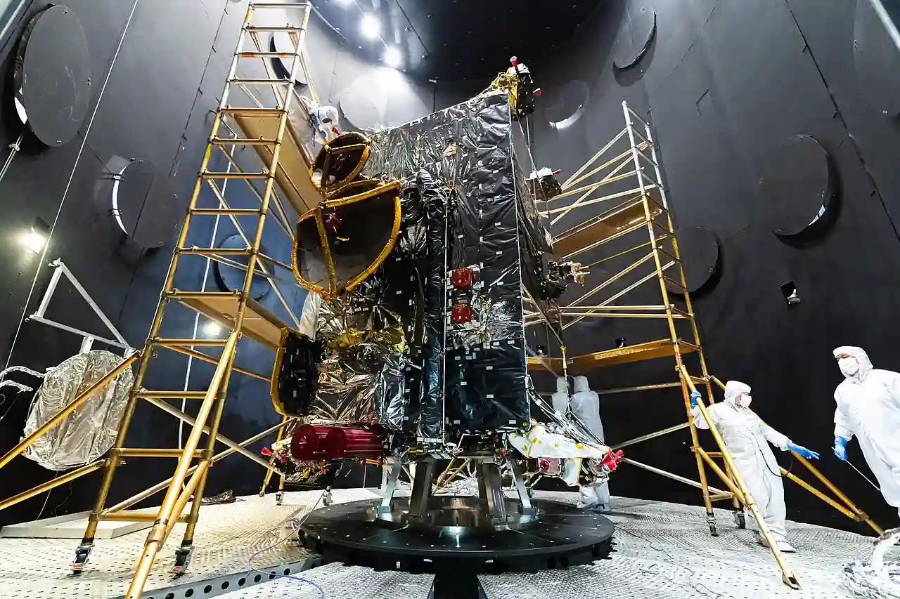 A spacecraft structure tested inside a thermal vacuum chamber