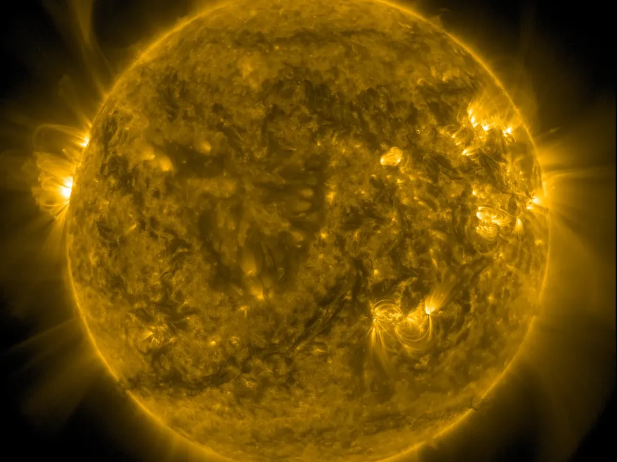 A detailed NASA image of the Sun's active surface and corona