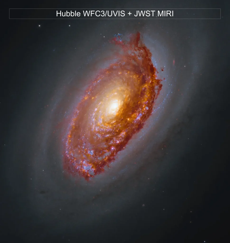 Messier 64, the Black Eye Galaxy, with Webb infrared light revealing dusty star-forming regions and the dark band across its core