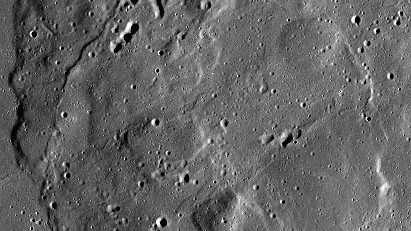 Lunar Reconnaissance Orbiter mosaic showing cratered volcanic terrain at Mons Rümker on the Moon.