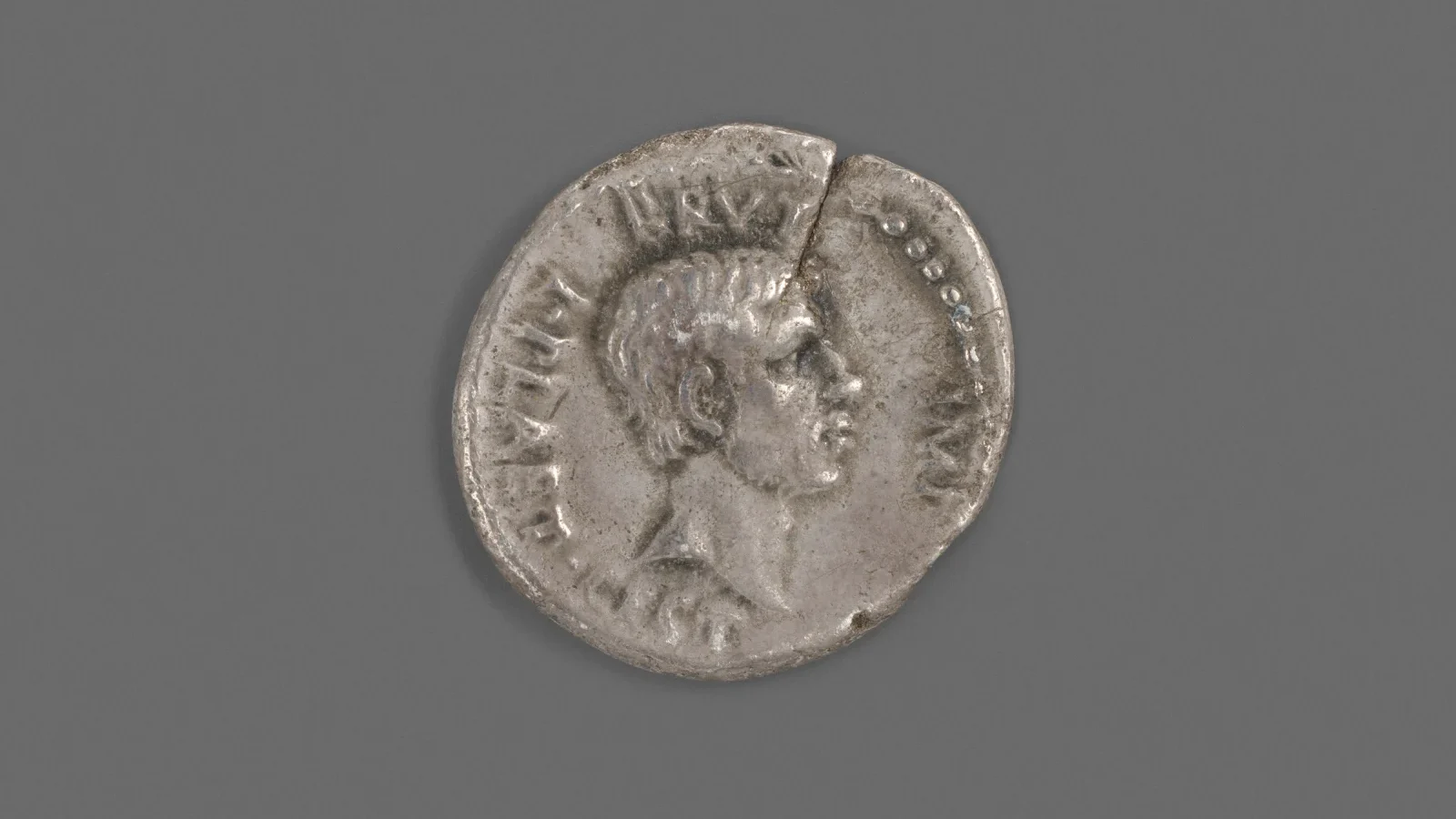 Silver Roman denarius bearing a portrait of Marcus Junius Brutus.