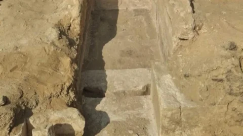 Excavation trench and stone remains from the newly reported Old Kingdom tomb at Saqqara