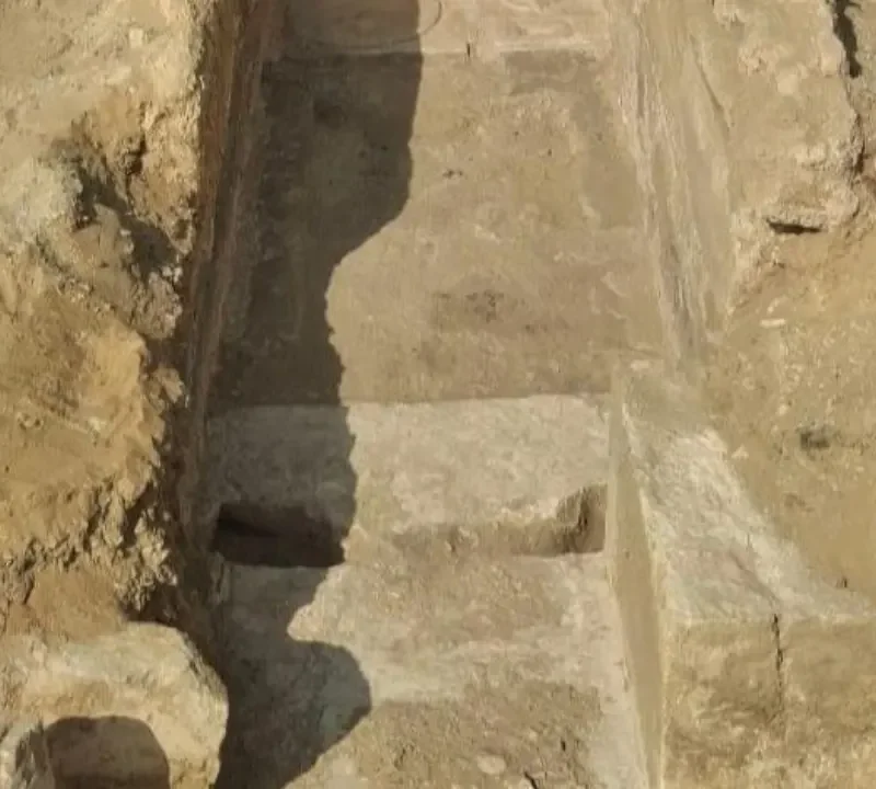 Excavation trench and stone remains from the newly reported Old Kingdom tomb at Saqqara