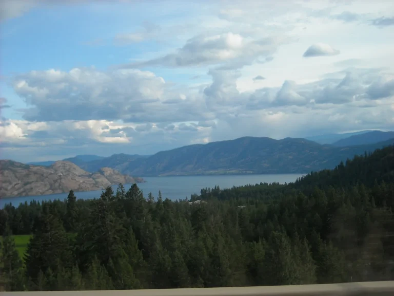 Okanagan Lake surrounded by dry hills near Trepanier, British Columbia.