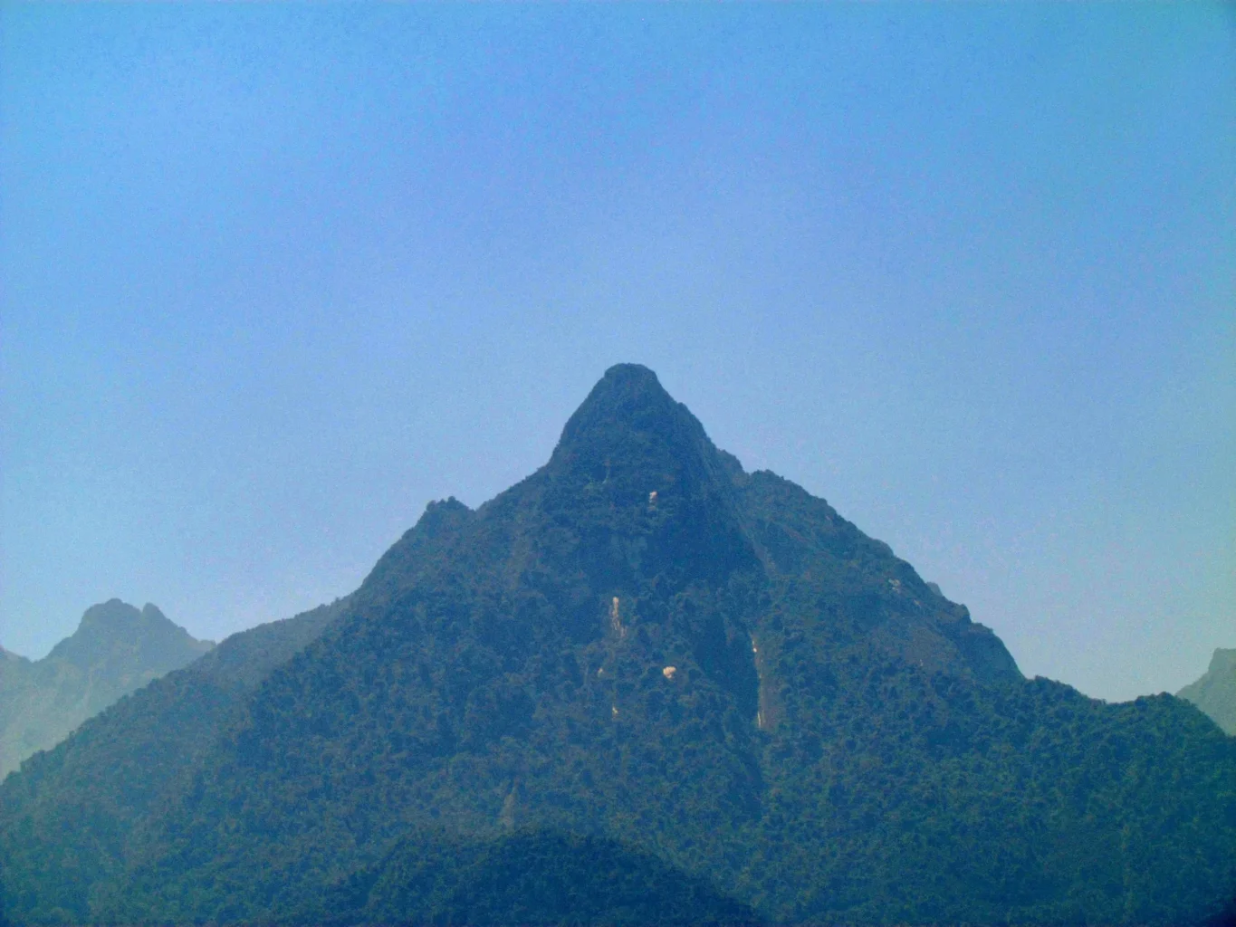 Forested Yanantin mountain rising near Machu Picchu in Peru